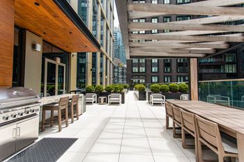 Outdoor terrace with bbq grills & sundeck